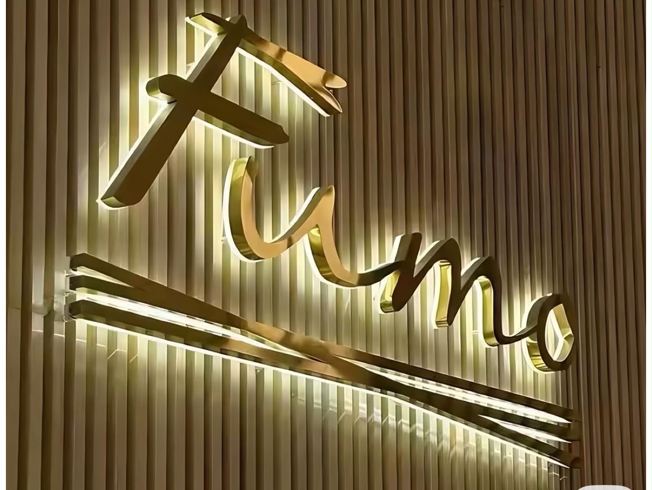 Gold halo lit 3D LED letters in the Fumo restaurant