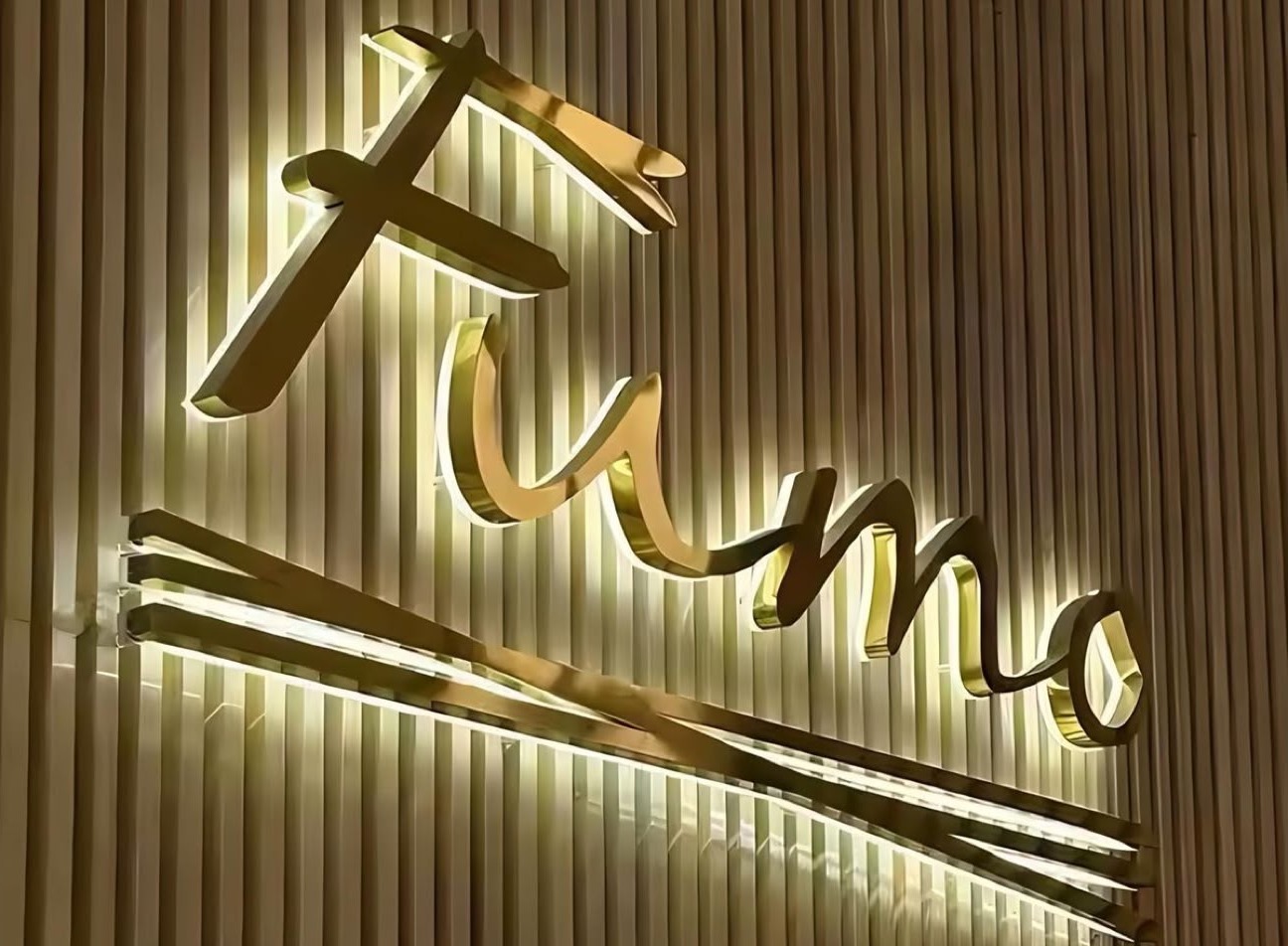 Gold stainless steel 3D LED letters with halo effect — Fumo restaurant